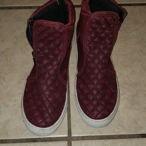Burgandy sneakers with a cute zipper at the side
